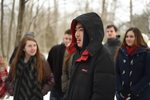 Students on BIOL103 & BIOL202 field trip walking to the ice on Lake Opinicon.