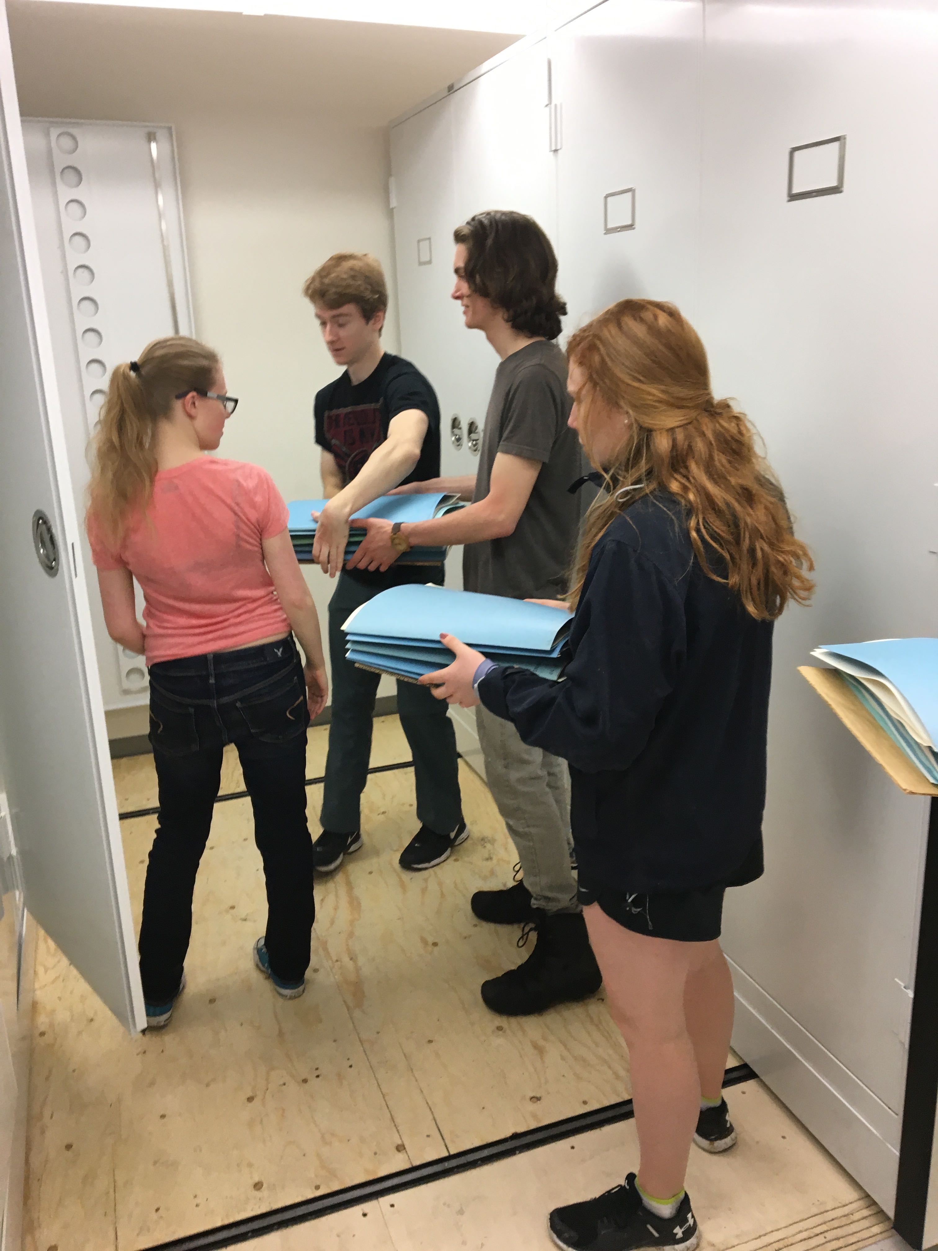 students moving specimens
